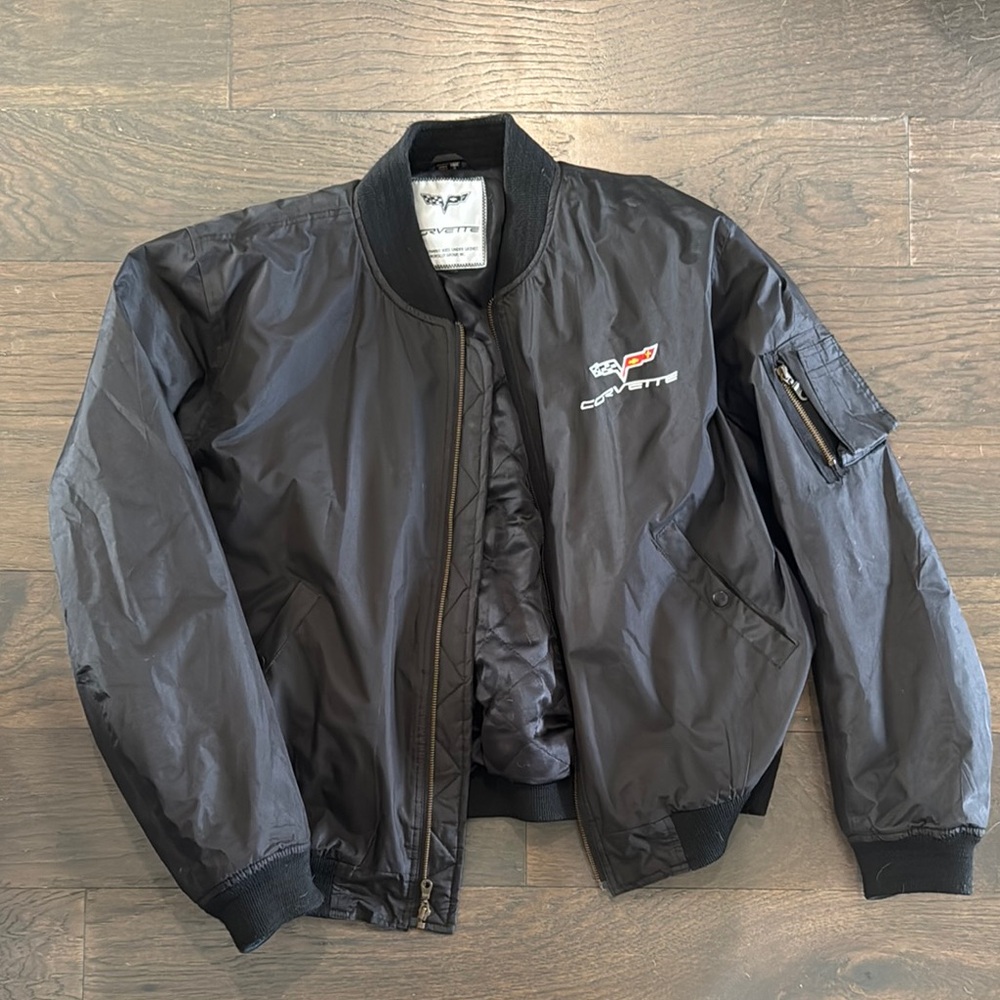 Black Bomber Jacket with Ribbed Details and Nylon Sheen